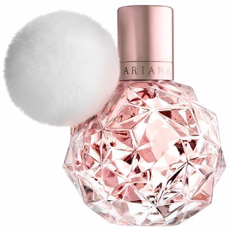 A pink ball with a fluffy pom pom on top, inspired by Ariana Grande Ariana Grande Ari 100ml Eau De Parfum fragrance.