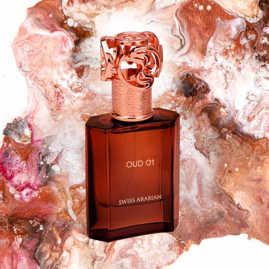 A bottle of Swiss Arabian Oud 01 50ml Eau De Parfum sitting on top of a colorful background.