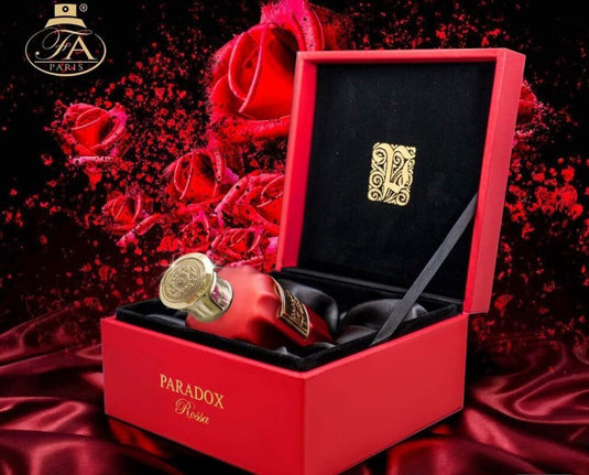A red box with a bottle of Paris Corner Fragrance Avenue Paradox Rossa 100ml Eau De Parfum from Dubai Perfumes in it.