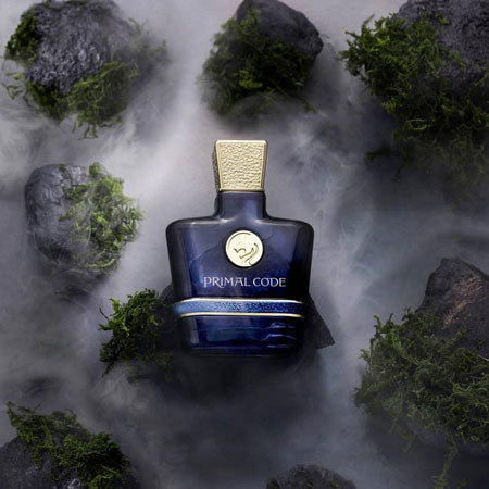 Load image into Gallery viewer, A moss-covered bottle of Swiss Arabian Primal code 100ml Eau De Parfum fragrance.
