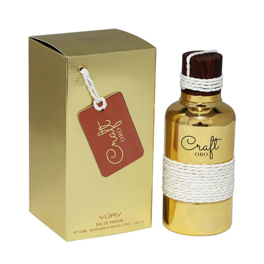 A gold bottle with a Dubai Perfumes Craft Oro 100ml Eau De Parfum tag on it placed next to a box.