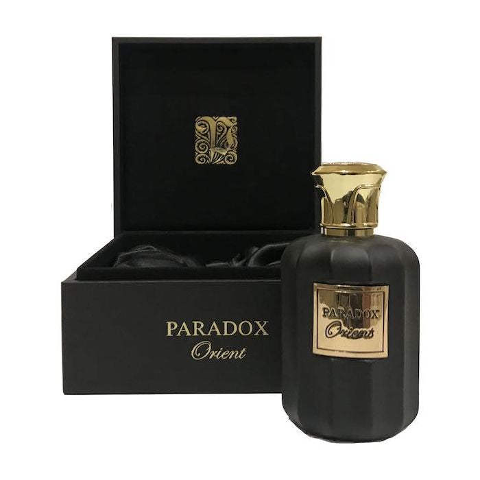 Load image into Gallery viewer, A fragrance bottle of Paris Corner Paradox Orient 100ml Eau De Parfum, elegantly presented in a black box.
