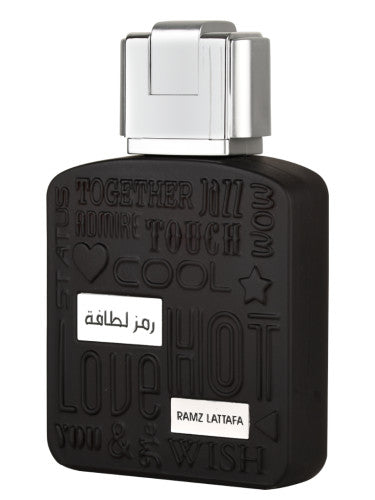 A bottle of Lattafa Ramz Silver 100ml Eau de Parfum with a black label on it.