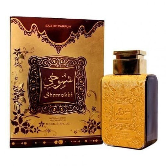 A bottle of Fragrance World Shamokhi 100ml Eau de Parfum with a gold box next to it, suitable for both men and women.