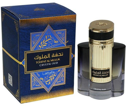 A bottle of Lattafa Tohfat Al Muluk Crystal Oud 100ml Eau de Parfum by Lattafa next to a box.