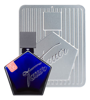 Load image into Gallery viewer, A bottle of Tauer No.06 Incense Rose 50ml Eau De Parfum, with a metal plate next to it.
