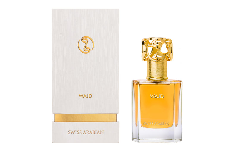 Load image into Gallery viewer, A bottle of Swiss Arabian Wajd 50ml Eau De Parfum embraced by a musky amber fragrance.
