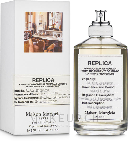 A 100ml bottle of Maison Martin Margiela Replica At The Barber's Eau De Toilette by Mason Margiela REPLICA displayed in front of a box.