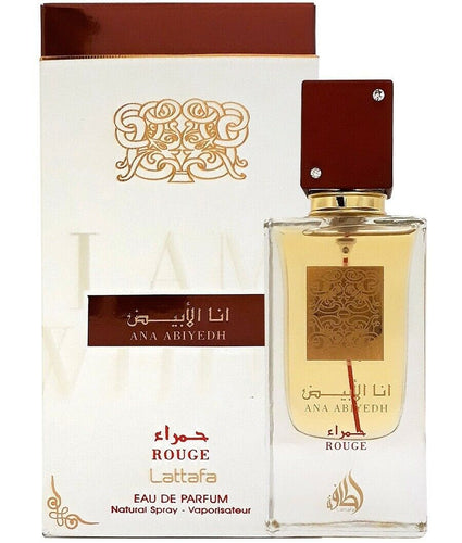 A bottle of Lattafa Ana Abiyedh Rouge 60ml Eau De Parfum perfume in a box by Dubai Perfumes.