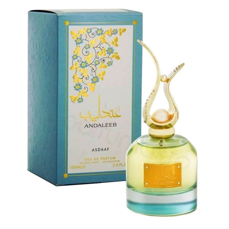 Load image into Gallery viewer, A bottle of Lattafa Asdaaf Andaleeb 100ml Eau de Parfum in front of a box.
