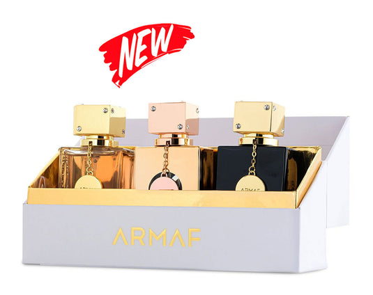 Limited edition bottles of Armaf Gift Set: Club de Nuit Women 30ml EDT + Club De Nuit Milestone 30ml EDP + Club De Nuit Intense Woman 30ml EDP, neatly packaged in a box, set against a white background.