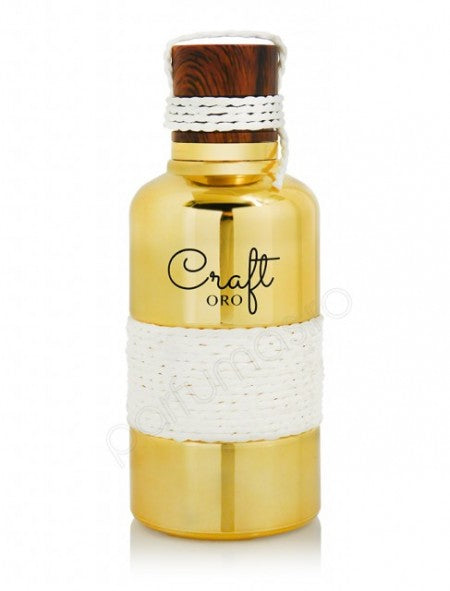 Dubai Perfumes' Craft Oro 100ml Eau De Parfum, a luxurious gold bottle adorned with a delicate rope, exudes an enchanting fragrance suitable for both men and women.