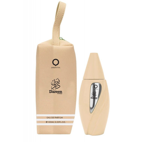A beige bottle of Orientica Dareen Anaqa 100ml Eau De Parfum with a bag next to it featuring fruity scents.