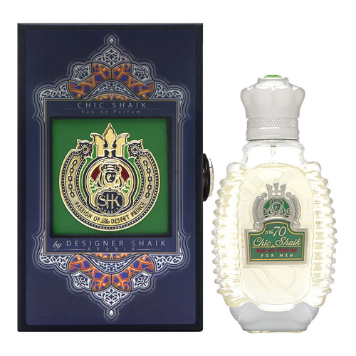 A bottle of Shaik Opulent Shaik Emerald No 70 — 80ml EDP with a green box next to it, exuding a woody ambery fragrance that embodies power and masculinity.