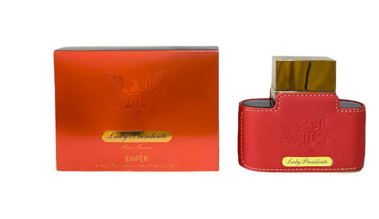 A red bottle of Emper Lady Presidente Pour Femme 80ml perfume from Rio Perfumes next to a box.