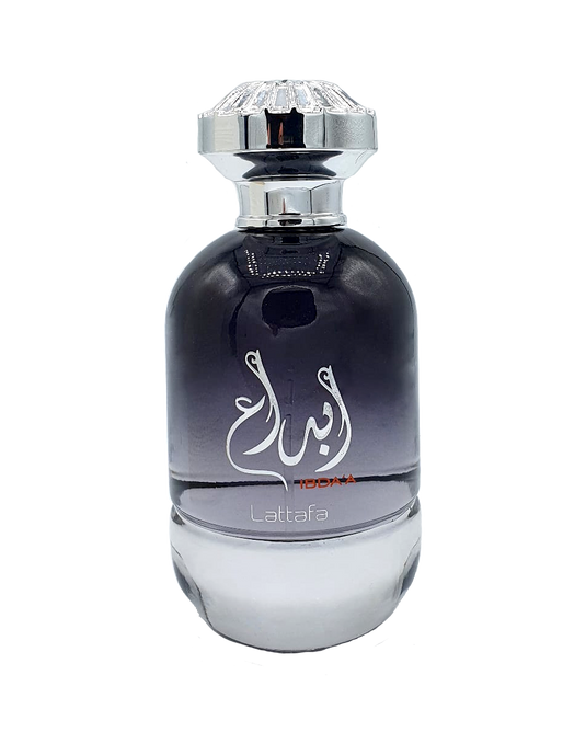 An exquisite bottle of Lattafa Ibda'a 100ml Eau De Parfum with arabic writing and captivating fragrance by Lattafa.