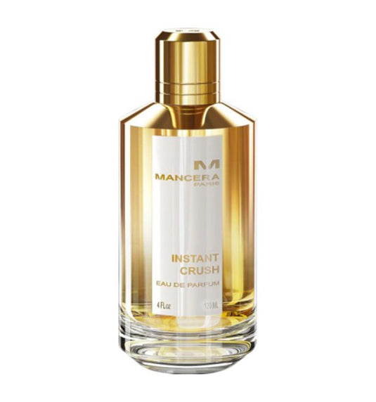 A golden Mancera Instant Crush 120ml Eau De Parfum bottle on a white background.
