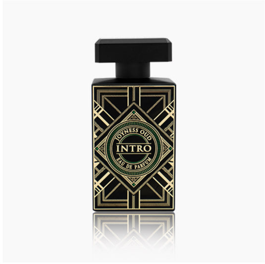 A bottle of Fragrance World Joyness Oud Intro 80ml Eau de Parfum by Dubai Perfumes with a gold and black design.