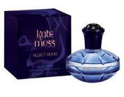 A 100ml bottle of Kate Moss Velvet Hour Eau De Toilette by Kate Moss is shown beside its dark blue packaging box.