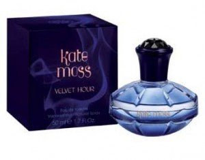 A 100ml bottle of Kate Moss Velvet Hour Eau De Toilette by Kate Moss is shown beside its dark blue packaging box.