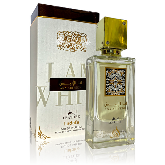 A gift set featuring a bottle of Lattafa Ana Abiyedh Leather 60ml Eau De Parfum by Dubai Perfumes, with a box, beautifully complemented by the luxurious Arabian Oud perfume.