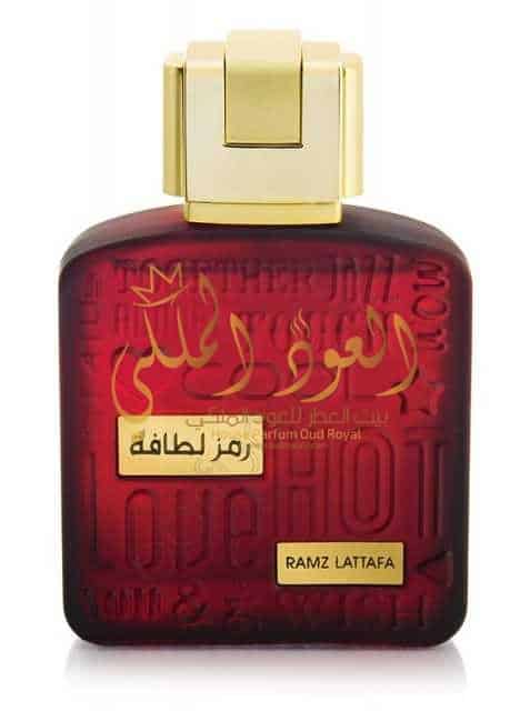 Load image into Gallery viewer, A bottle of Lattafa Ramz 100ml Eau De Parfum with a red label.
