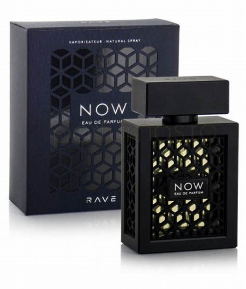 A black bottle of Dubai Perfumes Lattafa Rave Now Black 100ml Eau de Parfum, an eye-catching unisex fragrance, is displayed in front of its matching black box featuring geometric cutout details and bold white lettering.