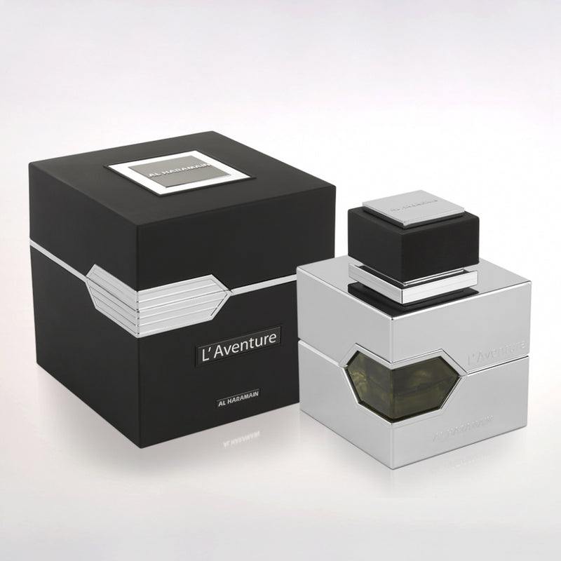 Load image into Gallery viewer, A bottle of Al Haramain L&#39;Aventure Intense 100ml perfume with a black box next to it.
