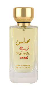 A bottle of Lattafa Mahasin Crystal 100ml Eau De Parfum with arabic writing on it.