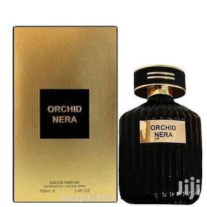 A bottle of Fragrance World Orchid Nera 100ml Eau de Parfum.