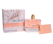 A bottle of Fragrance World Oro Rosa 100ml Eau De Parfum with a sensual scent in a box.
