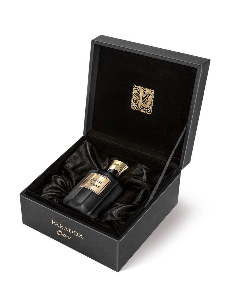 Load image into Gallery viewer, A Paris Corner Paradox Orient 100ml Eau De Parfum bottle in a black box.
