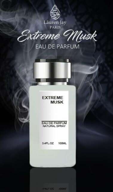 Load image into Gallery viewer, A bottle of Fragrance World Extreme Musk 100ml Eau de Parfum with smoke in the background.
