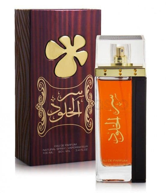 A bottle of Lattafa Ser Al Khulood 100ml Eau de Parfum fragrance with a box in front of it, suitable for both men and women.