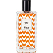 Lapidus Stories Suave Skin 100ml EDT by Ted Lapidus is a women’s fragrance in a rectangular glass bottle with orange wavy stripes and a black cap, reflecting the elegance of the brand.