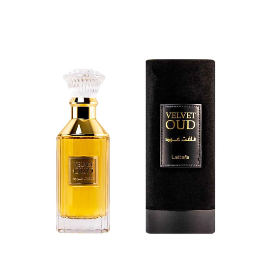 A bottle of Lattafa Velvet Oud 100ml Eau De Parfum with a box next to it, showcasing the exquisite fragrance of this Dubai Perfumes.
